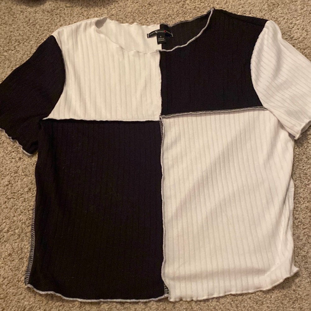 Size large. White and black shirt.